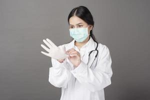 woman doctor is preparing to work with Coronavirus photo