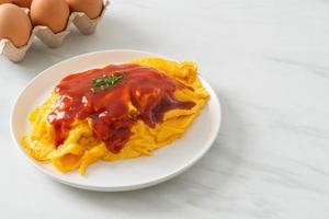 Flavored Fried Rice in an Omelet Wrapping photo