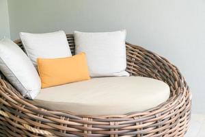 pillows on outdoor patio wicker sofa photo