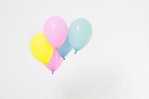 Colorful party balloons background. Isolated on white. Copy space photo