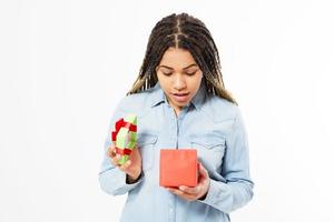 Surprised teen woman opened gift box and look inside when standing isolation over white, Happy new year christmas, x-mas concept photo
