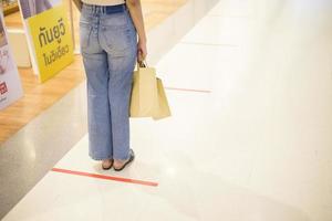 social distancing measure for COVID-19 prevention in shopping center ,Thailand photo