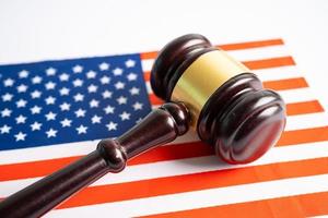 USA America flag with gavel for judge lawyer. Law and justice court concept. photo