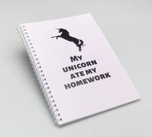 notepad cover with a Unicorn symbol on a white background photo