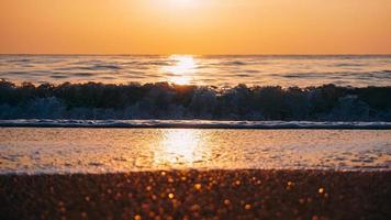 puesta de sol y playa foto