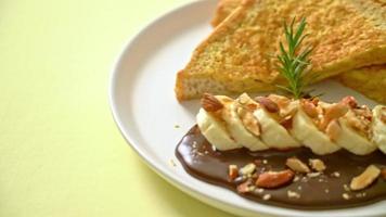 French toast with banana chocolate and almonds for breakfast video