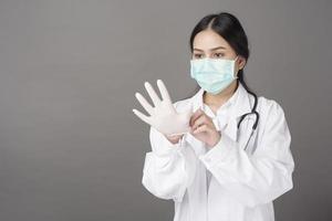 woman doctor is preparing to work with Coronavirus photo