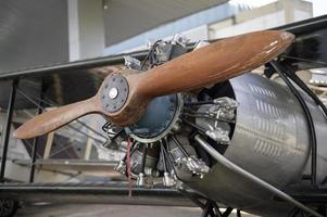 A small plane propeller in an airfield photo