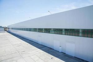 facade of an industrial building and warehouse in length photo