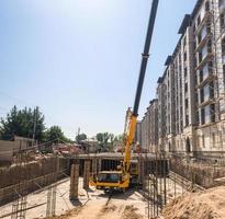 lifting machine on the construction site photo