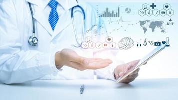 Close up of Doctor is showing medical analytics data, Medical technology concept photo