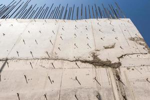 concrete wall with reinforcement. building background photo