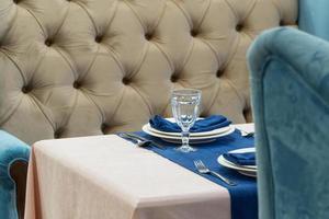 serving banquet table in a luxurious restaurant in blue and light style photo