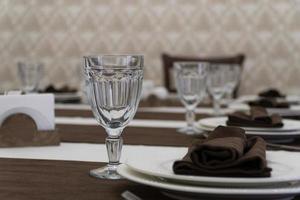 serving banquet table in a luxurious restaurant in brown and white style photo