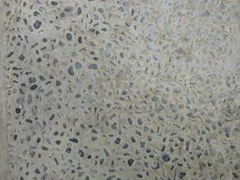 texture of small black rocks in a yard of the house photo