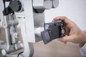 doctor oculist at work. diagnostic ophthalmologic equipment. medicine concept photo