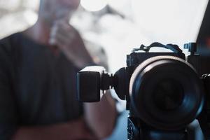 digital camera closeup on the background silhouette a photographer photo