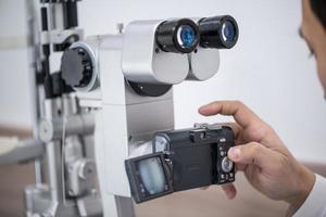 doctor oculist at work. diagnostic ophthalmologic equipment. medicine concept photo