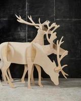 New Year's and Christmas decoration deer made of plywood and wood photo