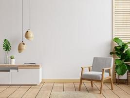 Living room interior wall mockup in warm tones,gray armchair with wood cabinet. photo