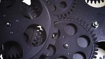 Close Up Shot Of Black Gear Cogs Rotating Working video