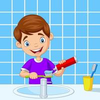 Cute Little Boy cepillarse los dientes en el baño. vector