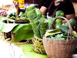 The banana leaf packaging. Market ditches plastic packaging for banana leaves. Reduce single-use plastic idea. Banana leaves are the traditional packaging material in Asia.