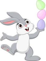 Cartoon little bunny with Easter eggs vector