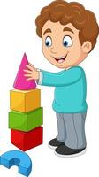 Cartoon boy playing with building blocks vector