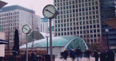 LONDON -UK, Businessmen going to work in Canary Wharf in London. Canary Wharf is a major business district, time lapse video