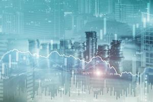 Finance Capital banking and investment concept, Double exporsure stacked of coins and city with graph mixed media photo