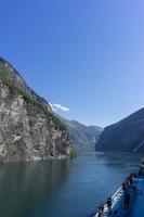 Cruise ship at Geiranger fjord in Norway photo