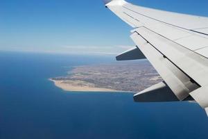 Under the wing of the plane photo