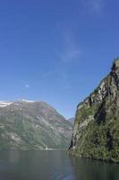 Cruise in Geiranger fjord in Norway photo