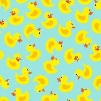 Seamless yellow ducks pattern vector