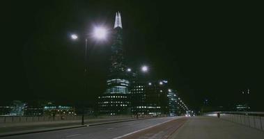 Traffic and pedestrians on London Bridge in London, time lapse video