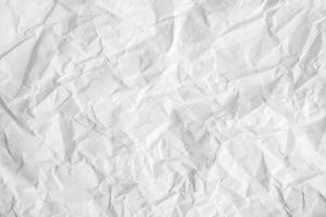 Crumpled white paper texture as a background image. Paper for design with copy space for text or image. Top view. Copy, empty space for text photo