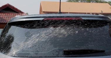 Wiper cleans windshield background, Front view Concept Car Service, Car Wash. video