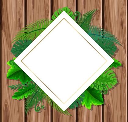 Rotated square frame with tropical green leaves