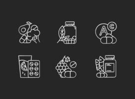 Vitamin intake chalk icons set. Vegetables and fruits for healthcare. Pharmaceutical aid. Diet supplement. Medication and pills. Multivitamin complex. Isolated vector chalkboard illustrations