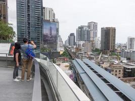 EmQuartier Shopping Center BANGKOKTHAILAND18 AUGUST 2018 The tourists are taking photos of the city center of Bangkok on the sky garden and water park. on 18 AUGUST 2018 in Thailand.