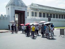 Wat Phra Kaew Temple of the Emerald BuddhaBANGKOK THAILAND30 OCTOBER 2018Tourists and Chinese tourists are walking to visit the temple in Bangkok. photo