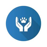 Animal welfare flat design long shadow glyph icon. Hands holding paw. Pets care. Vector silhouette illustration