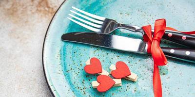 valentines day table setting romance date cutlery fork, knife, plate photo