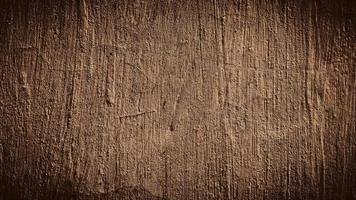 Fondo de textura de pared de hormigón de cemento abstracto marrón sucio foto