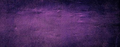 grunge abstract old cement concrete wall texture background purple color photo