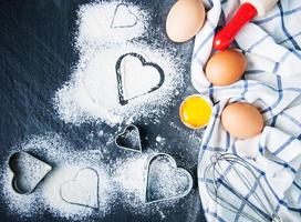 Baking ingredients on a black photo