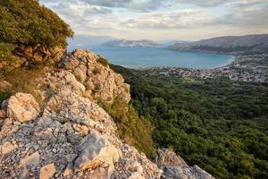 View on the town and beach of Baska on an island of Krk in Croatia. photo