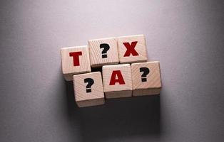 Tax Word with Wooden Cubes photo