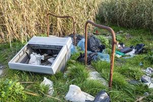 waste abandoned by people along the periphery photo